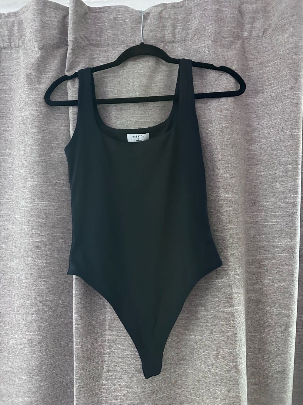 Babaton Black Sleeveless One-Piece Bodysuit for Kids